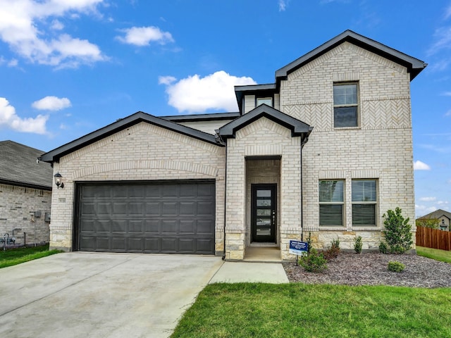 9100 Cacti Ct, Fort Worth, TX 76036 - french country style house featuring brick siding, a garage, and concrete driveway