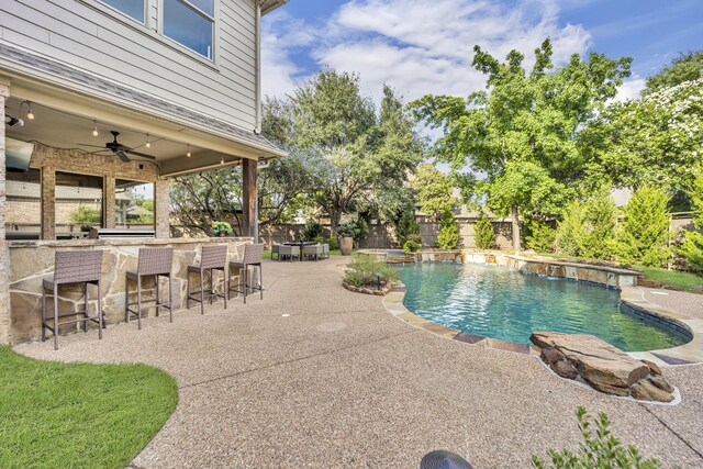 7209 Braemar Ter, Colleyville, TX 76034 - view of swimming pool with a ceiling fan, a patio, and a pool with connected hot tub