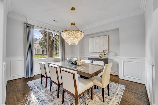 7209 Braemar Ter, Colleyville, TX 76034 - dining area with a chandelier, ornamental molding, a wainscoted wall, a decorative wall, and dark wood-type flooring