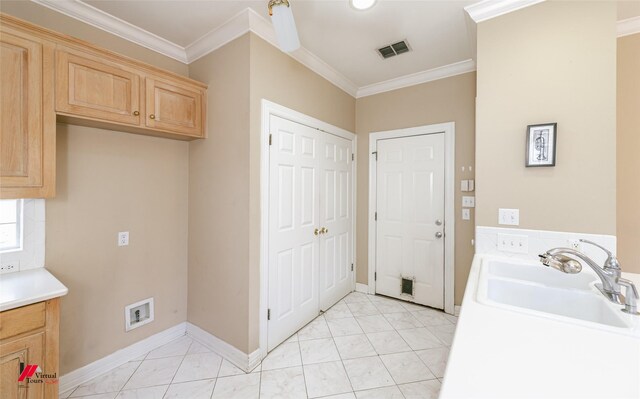 3635 Greenacres Place Dr Unit 350, Bossier City, LA 71111 - kitchen featuring a sink, light marble finish flooring, crown molding, light countertops, and baseboards