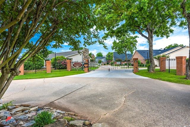 3635 Greenacres Place Dr Unit 350, Bossier City, LA 71111 - view of concrete road with a gate and a residential view
