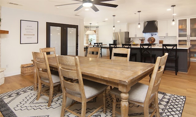 13417 Hickory Creek Dr, Haslet, TX 76052 - dining room with ceiling fan, light wood-style floors, recessed lighting, and baseboards