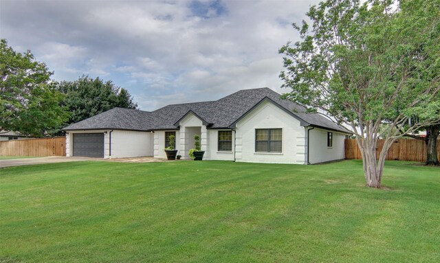 13417 Hickory Creek Dr, Haslet, TX 76052 - view of front facade featuring a garage, driveway, and roof with shingles