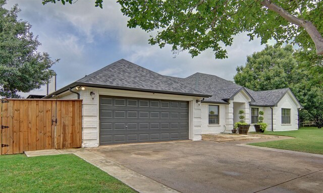 13417 Hickory Creek Dr, Haslet, TX 76052 - view of front facade featuring a shingled roof, driveway, and an attached garage