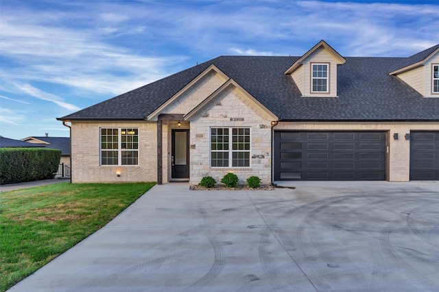 5128 Country Club Dr, Granbury, TX 76049 - view of front facade with roof with shingles, concrete driveway, a garage, a front yard, and stone siding