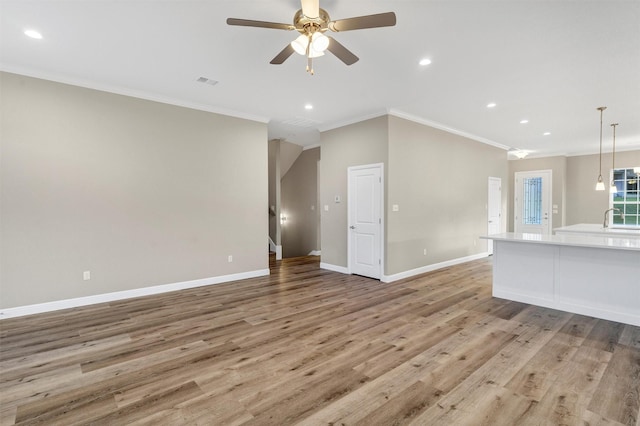 5128 Country Club Dr, Granbury, TX 76049 - unfurnished living room featuring crown molding, a sink, light wood-style flooring, ceiling fan, and baseboards