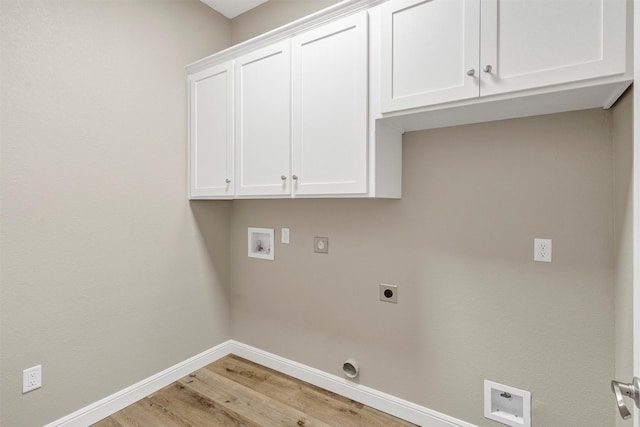 5128 Country Club Dr, Granbury, TX 76049 - laundry area with electric dryer hookup, cabinet space, baseboards, washer hookup, and light wood finished floors