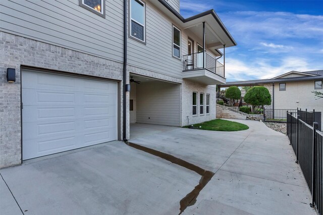 5128 Country Club Dr, Granbury, TX 76049 - view of side of property with a garage, a balcony, and driveway