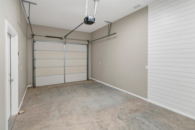 5128 Country Club Dr, Granbury, TX 76049 - garage featuring a garage door opener and baseboards