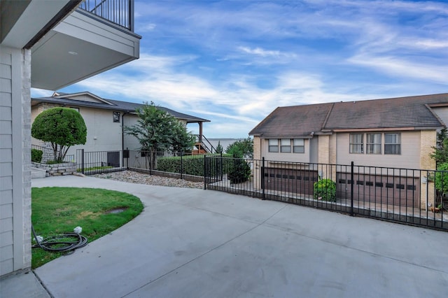 5128 Country Club Dr, Granbury, TX 76049 - view of side of home featuring a patio and brick siding