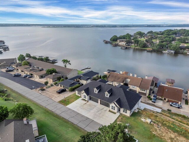 5128 Country Club Dr, Granbury, TX 76049 - aerial view of residential area with a nearby body of water