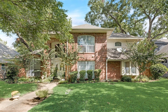 1412 Hyde Park Ln, Arlington, TX 76015 - view of front of house with a front lawn, brick siding, and a shingled roof