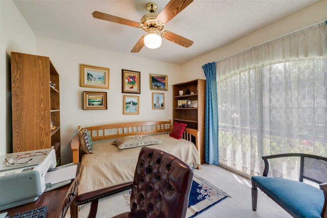 1412 Hyde Park Ln, Arlington, TX 76015 - carpeted dining area featuring ceiling fan and a textured ceiling