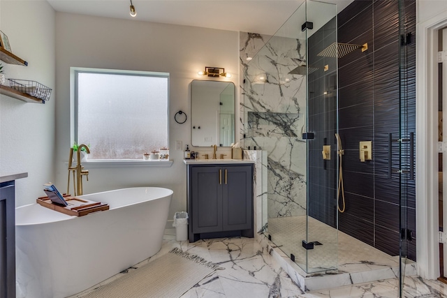 9808 Capilano Dr, Plano, TX 75025 - bathroom featuring marble finish floors, a freestanding tub, vanity, and a stall shower