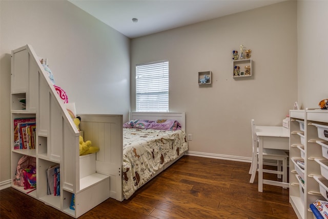 9808 Capilano Dr, Plano, TX 75025 - bedroom with wood finished floors and baseboards