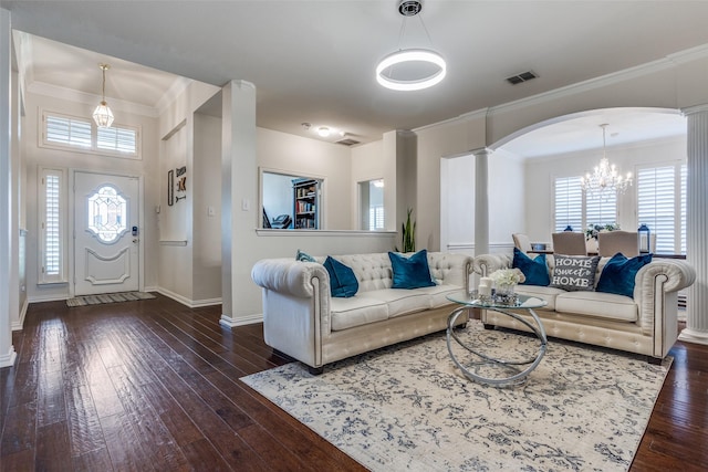 9808 Capilano Dr, Plano, TX 75025 - living area with decorative columns, arched walkways, baseboards, hardwood / wood-style floors, and ornamental molding