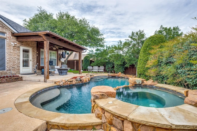 9808 Capilano Dr, Plano, TX 75025 - view of pool featuring a patio, a ceiling fan, a fenced backyard, a pool with connected hot tub, and outdoor dining area