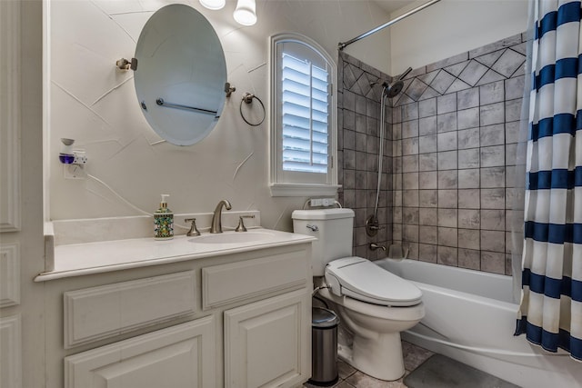 9808 Capilano Dr, Plano, TX 75025 - bathroom featuring toilet, shower / bath combination with curtain, and vanity
