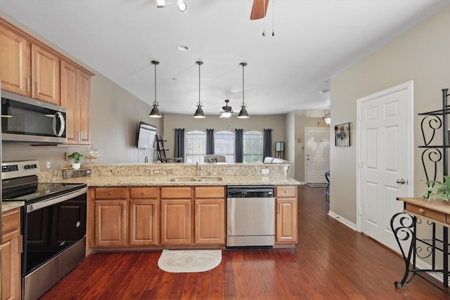575 S Virginia Hills Dr Unit 3702, Mckinney, TX 75070 - kitchen with stainless steel appliances, a ceiling fan, a sink, a peninsula, and dark wood-style flooring