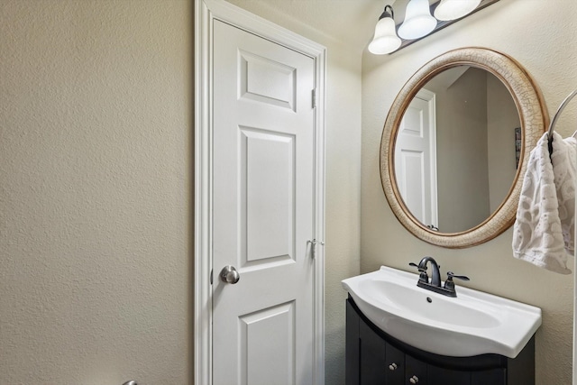 575 S Virginia Hills Dr Unit 3702, Mckinney, TX 75070 - bathroom with vanity and a textured wall