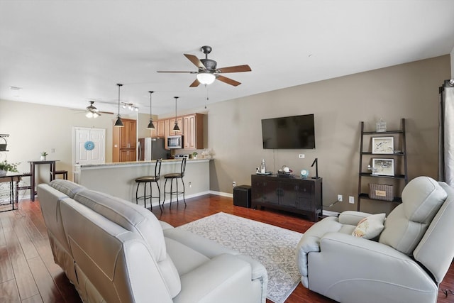575 S Virginia Hills Dr Unit 3702, Mckinney, TX 75070 - living room with a ceiling fan, dark wood-type flooring, and baseboards
