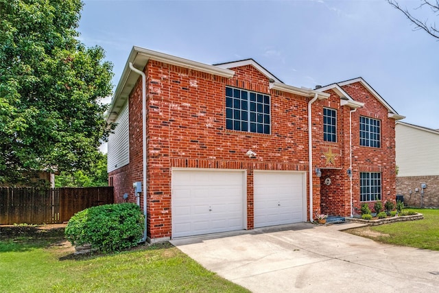1017 Lake Trail Dr, Little Elm, TX 75068 - traditional-style house featuring an attached garage, driveway, and brick siding