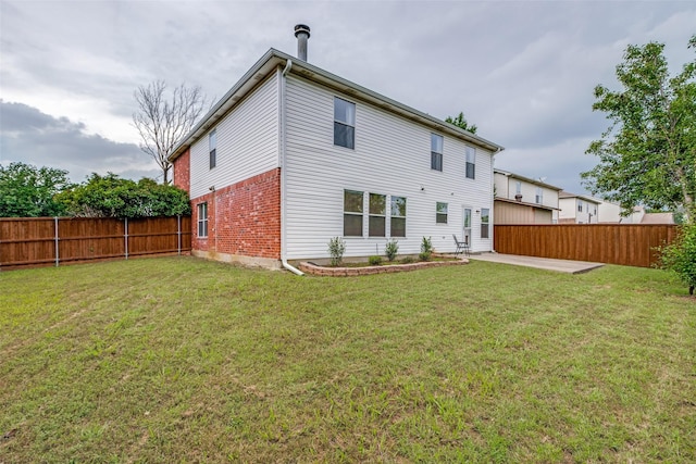 1017 Lake Trail Dr, Little Elm, TX 75068 - rear view of house with brick siding and a patio area