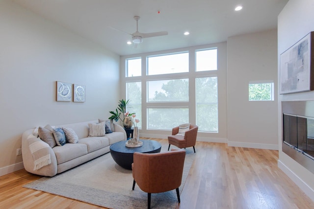 2111 Clark St Unit C, Dallas, TX 75204 - living room with healthy amount of natural light, baseboards, light wood-style flooring, ceiling fan, and recessed lighting