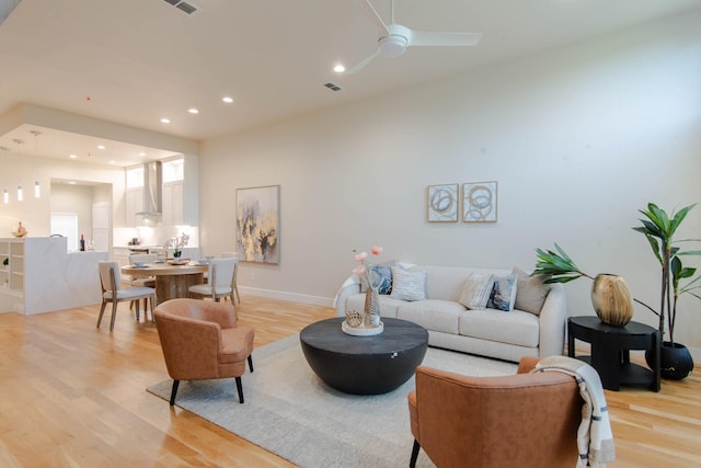 2111 Clark St Unit C, Dallas, TX 75204 - living area with light wood-type flooring, ceiling fan, recessed lighting, and baseboards
