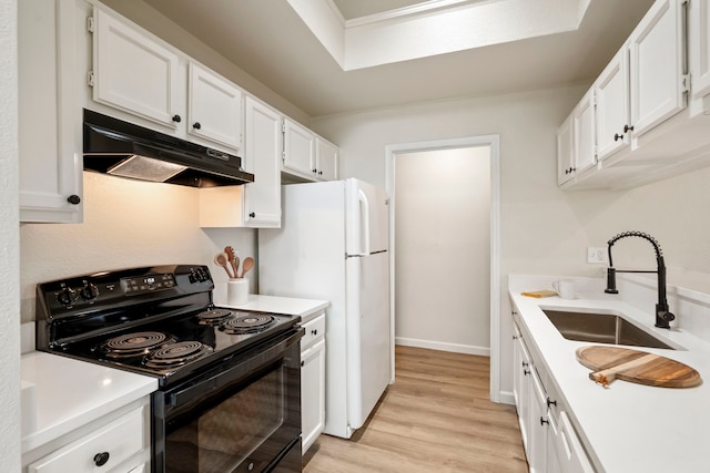 808 Brockden Dr, Mesquite, TX 75149 - kitchen featuring black range with electric stovetop, a sink, under cabinet range hood, and light countertops
