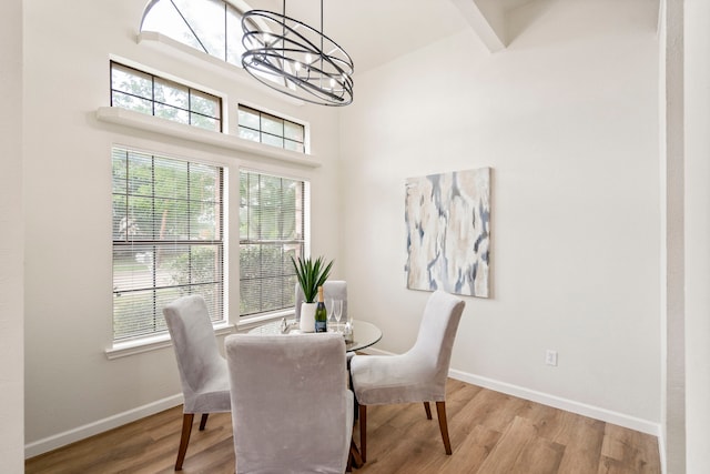 808 Brockden Dr, Mesquite, TX 75149 - dining room featuring a chandelier, wood finished floors, and baseboards