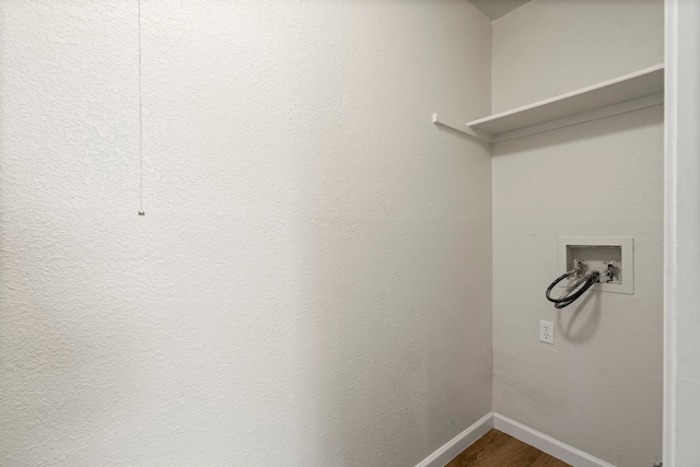 808 Brockden Dr, Mesquite, TX 75149 - laundry area featuring washer hookup, baseboards, and dark wood finished floors