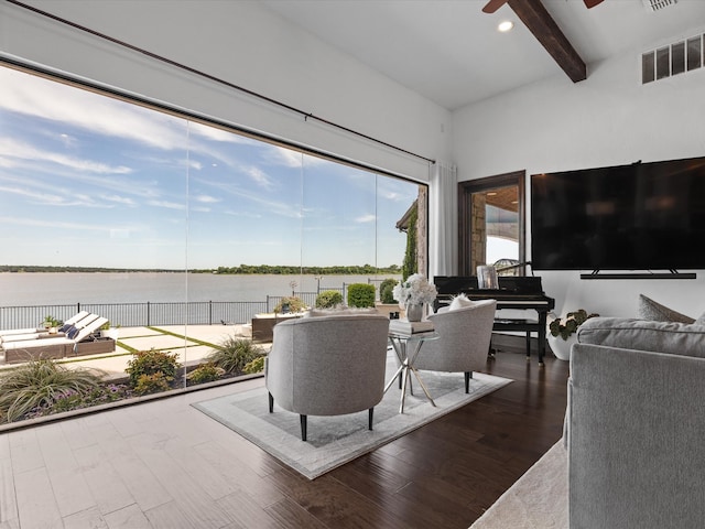 12633 Lakeview Ct, Fort Worth, TX 76179 - living area featuring beamed ceiling, wood finished floors, and a ceiling fan