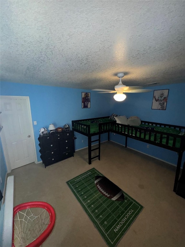 4331 Stetson Run, San Antonio, TX 78223 - carpeted bedroom with a textured ceiling and a ceiling fan