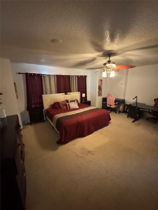 4331 Stetson Run, San Antonio, TX 78223 - carpeted bedroom with a textured ceiling and a ceiling fan