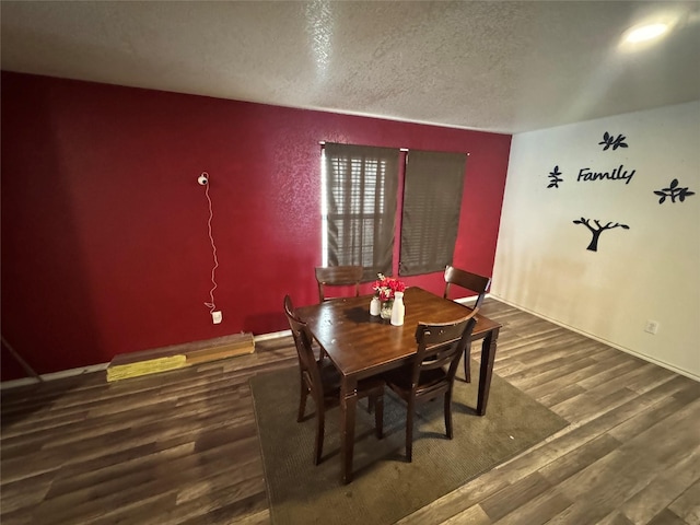 4331 Stetson Run, San Antonio, TX 78223 - dining area featuring wood finished floors, a textured ceiling, and baseboards