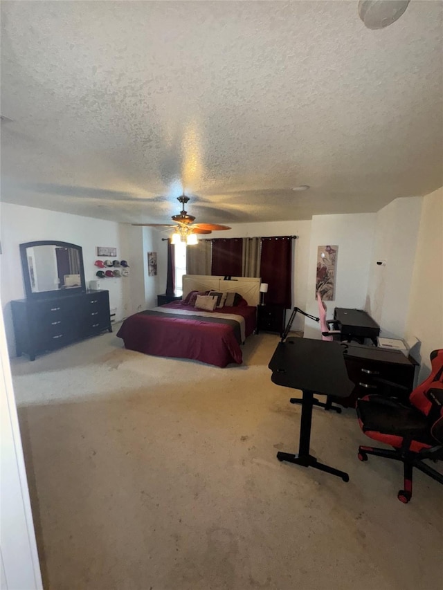 4331 Stetson Run, San Antonio, TX 78223 - bedroom featuring a textured ceiling, carpet flooring, a ceiling fan, and a desk