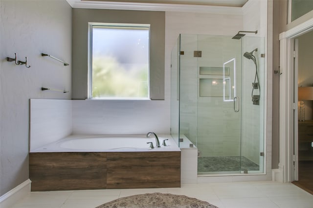 1360 Bent Trail Cir, Southlake, TX 76092 - bathroom featuring a stall shower, a garden tub, crown molding, and tile patterned flooring