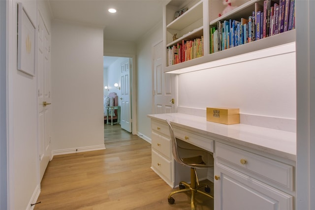 1360 Bent Trail Cir, Southlake, TX 76092 - office area featuring light wood-style floors, built in desk, crown molding, and recessed lighting