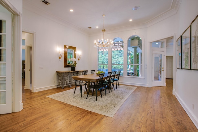 1360 Bent Trail Cir, Southlake, TX 76092 - dining room with a chandelier, wood finished floors, ornamental molding, and recessed lighting