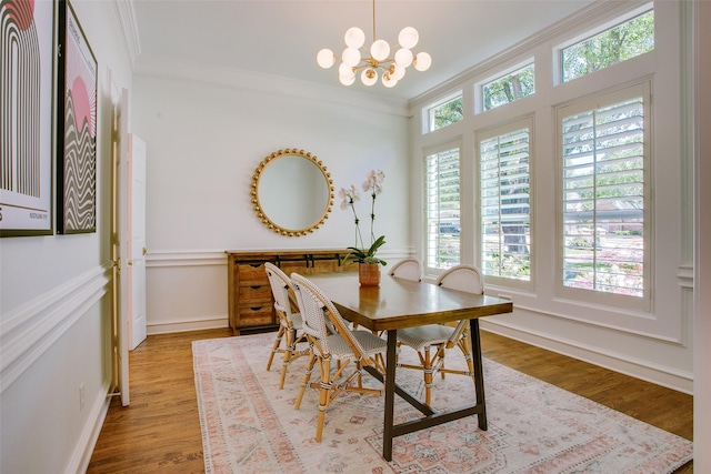 1360 Bent Trail Cir, Southlake, TX 76092 - dining room with ornamental molding, a chandelier, and wood finished floors