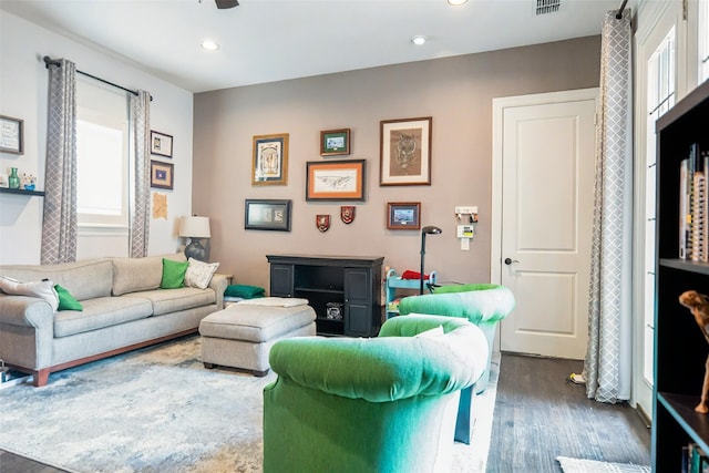 8051 Harliquin Ct, Frisco, TX 75035 - living area with wood finished floors, plenty of natural light, and recessed lighting