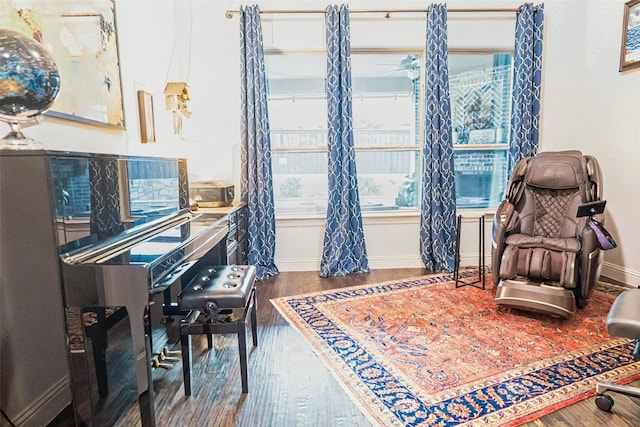 8051 Harliquin Ct, Frisco, TX 75035 - sitting room with wood finished floors and baseboards