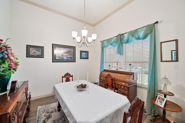 2109 County Road 4522, Justin, TX 76247 - dining area featuring ornamental molding, wood finished floors, a chandelier, and baseboards