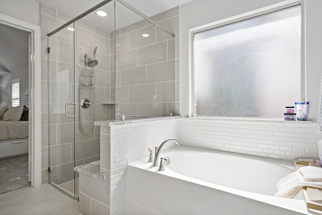 1801 Emerald Vista Blvd, Wylie, TX 75098 - ensuite bathroom featuring a garden tub, a shower stall, tile walls, and recessed lighting