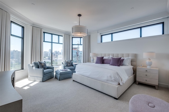2828 Hood St Unit 1303, Dallas, TX 75219 - bedroom featuring light carpet, ornamental molding, and a city view