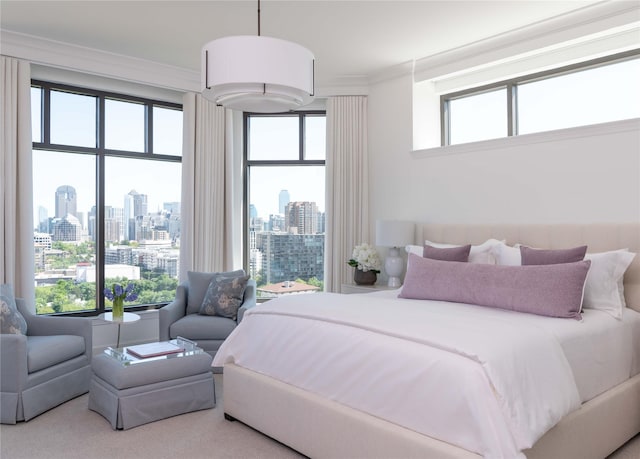 2828 Hood St Unit 1303, Dallas, TX 75219 - carpeted bedroom featuring a skyline view and crown molding