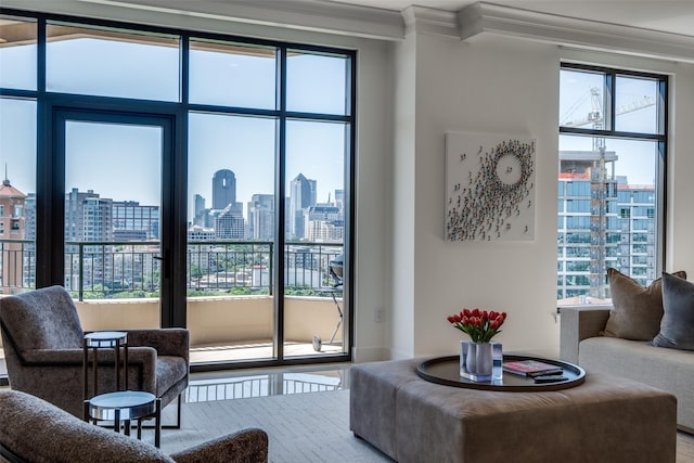 2828 Hood St Unit 1303, Dallas, TX 75219 - living room with ornamental molding, a skyline view, and wood finished floors