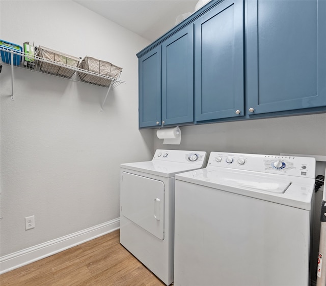 386 Frederick Dr, Robinson, TX 76706 - washroom featuring independent washer and dryer, cabinet space, light wood-style flooring, and baseboards
