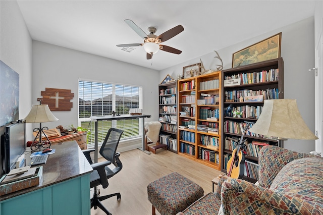386 Frederick Dr, Robinson, TX 76706 - office area with a ceiling fan and wood finished floors